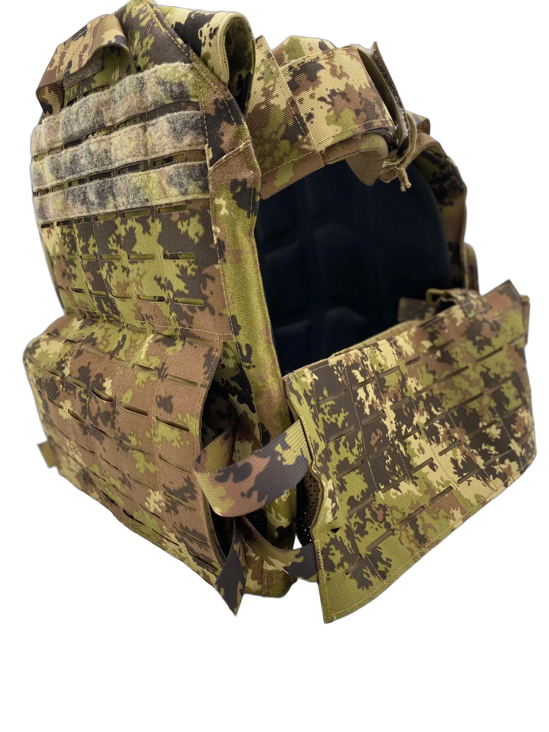 Angled three-quarter view of the digital woodland camo plate carrier with open plate cavity, laser-cut MOLLE panels, and shoulder harness