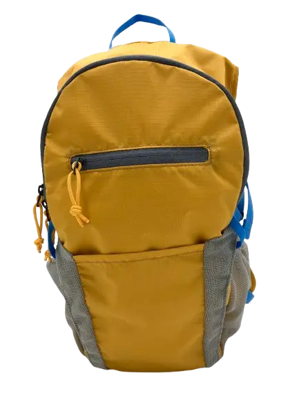 Front view of the mustard-yellow daypack showing the main compartment zipper and grey lower pocket