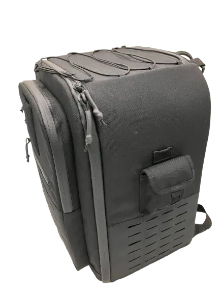 Front three-quarter view of dark grey tactical backpack with laser-cut MOLLE lower panel and front zippered pocket