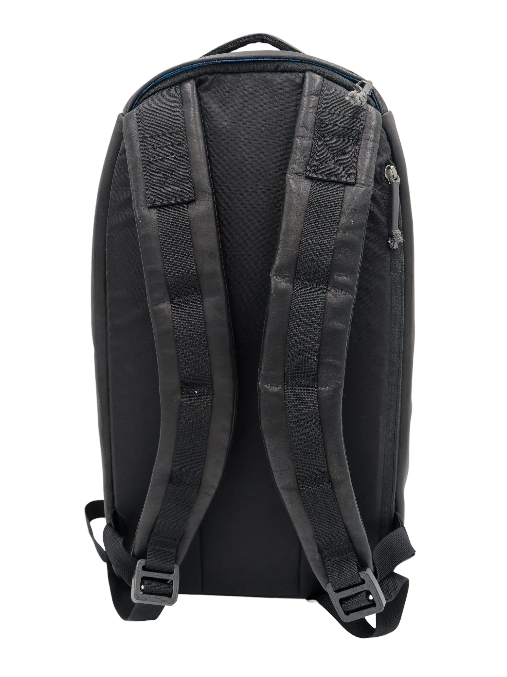 Rear view of the goat leather backpack showing the padded back panel and two padded shoulder straps with metal buckles