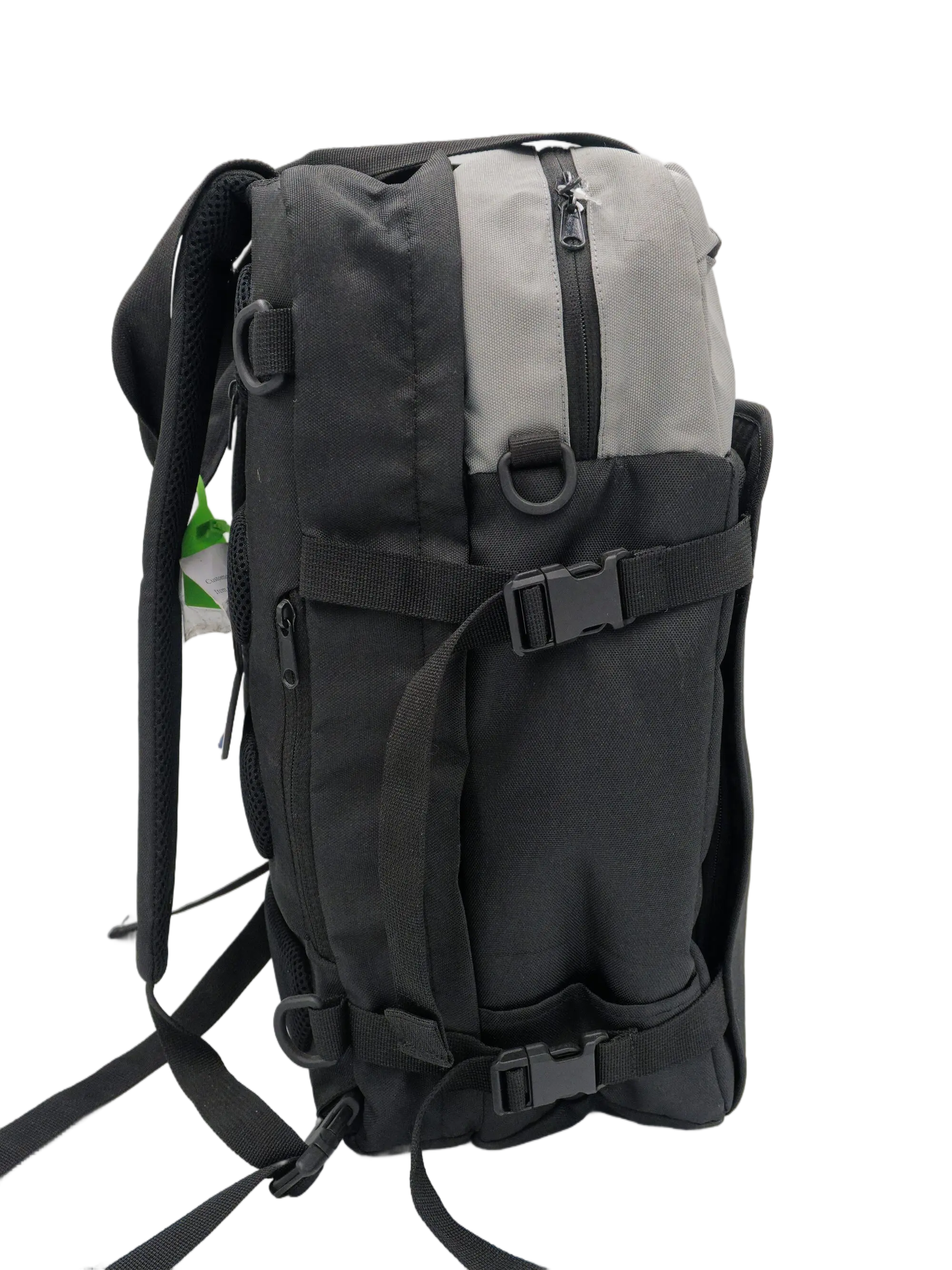Side profile of the backpack showing the external zip pocket, black compression buckle, and grey upper panel