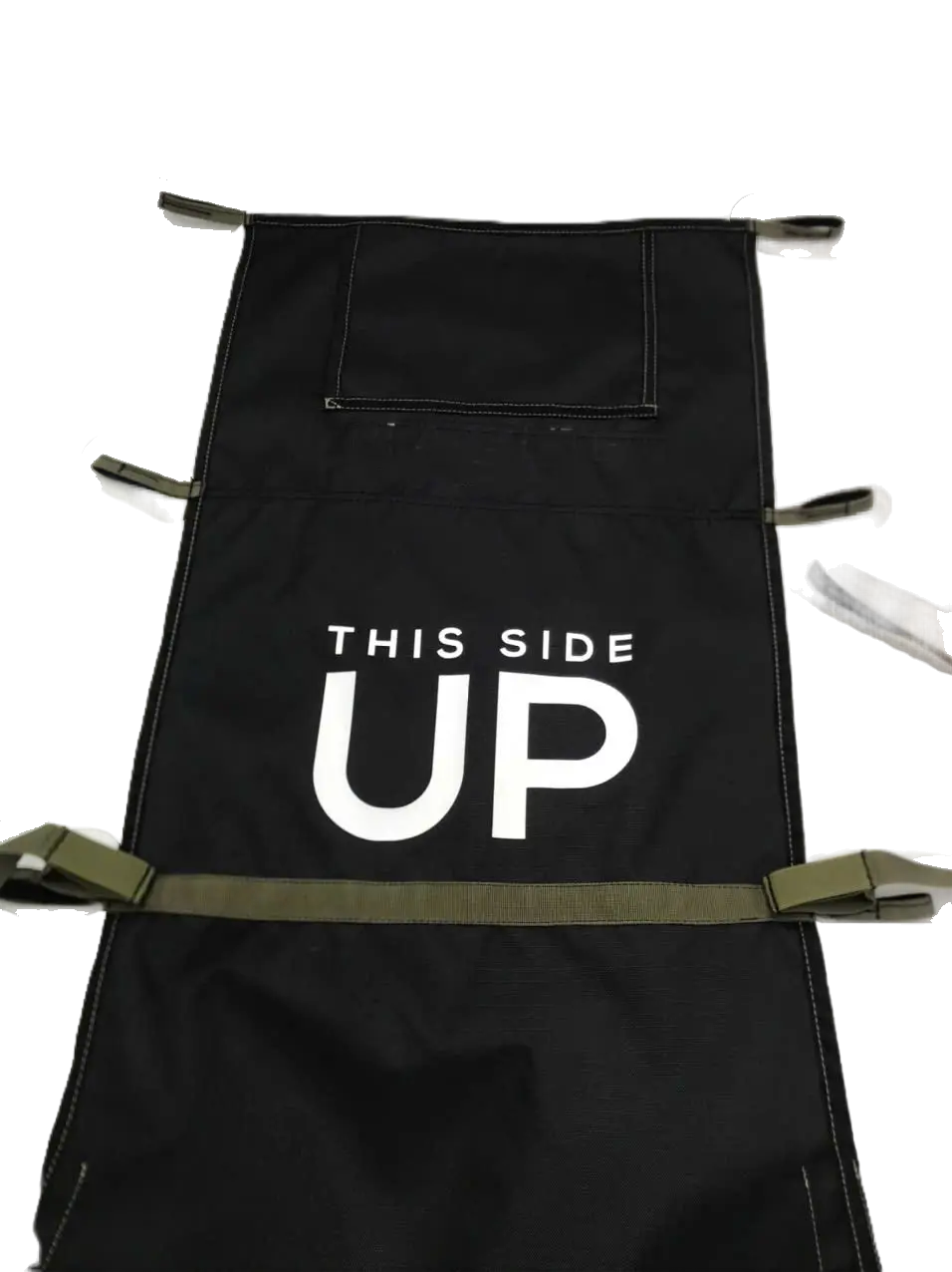 Close-up of the upper section of the stretcher showing the 'THIS SIDE UP' orientation marking and olive webbing strap