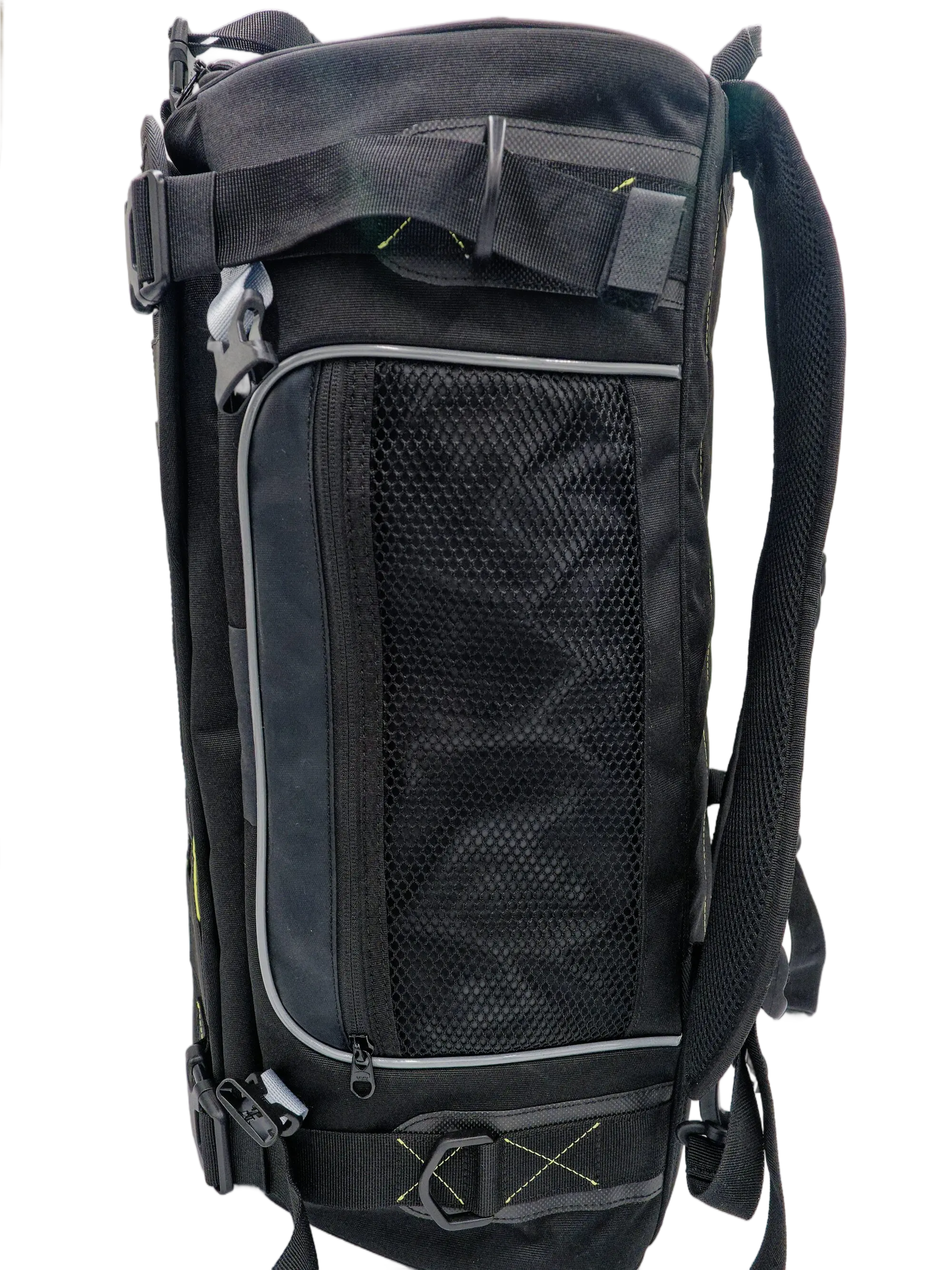 Side view of the Cordura ADV backpack showing mesh pocket, compression straps with yellow stitching and side zipper access