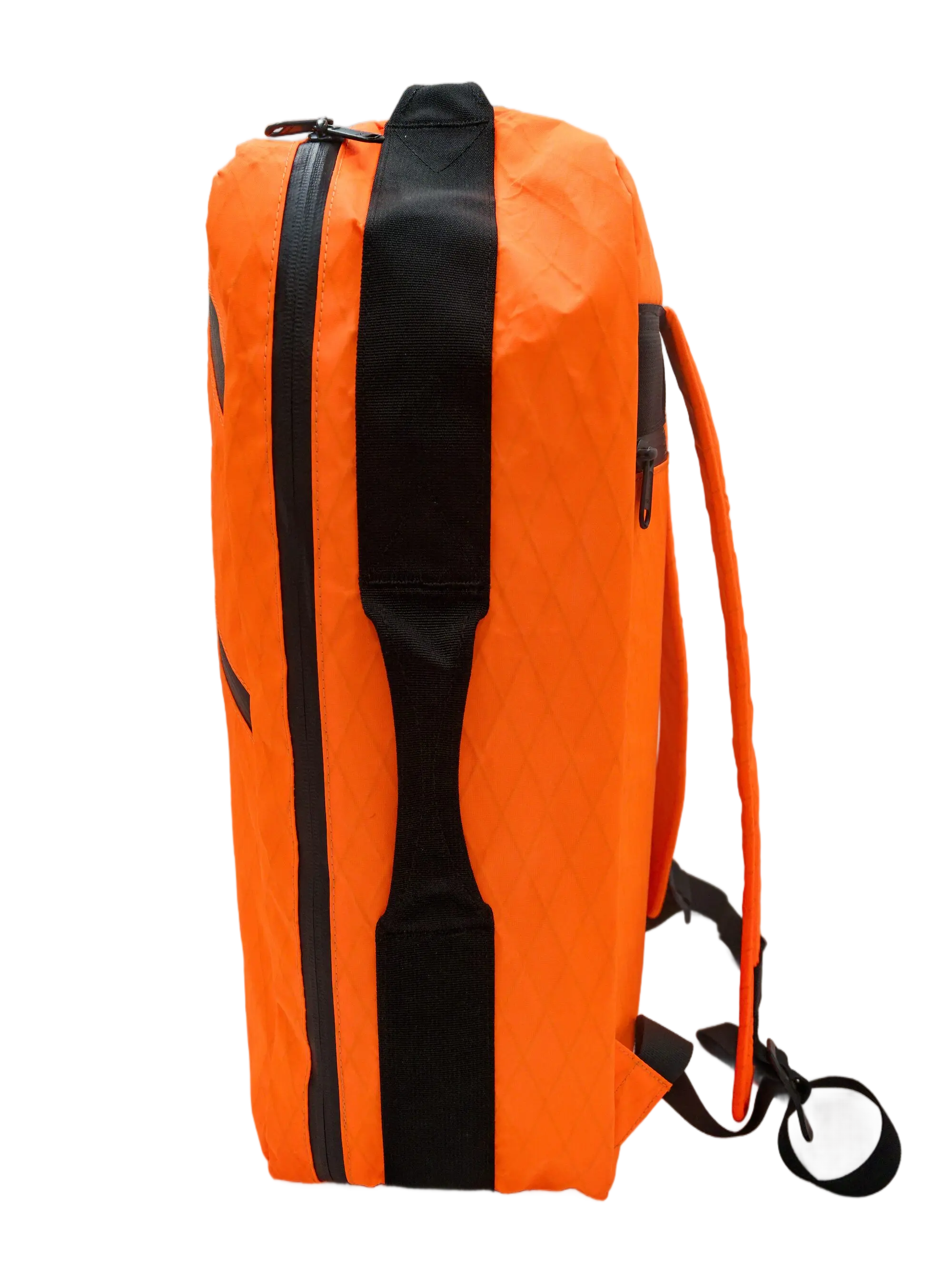 Left side view of the orange weekender backpack showing black vertical handle strap and side pocket