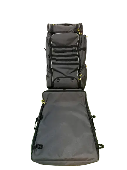 Lower door opened flat showing the grey padded base and upper section with horizontal black MOLLE straps and yellow hardware