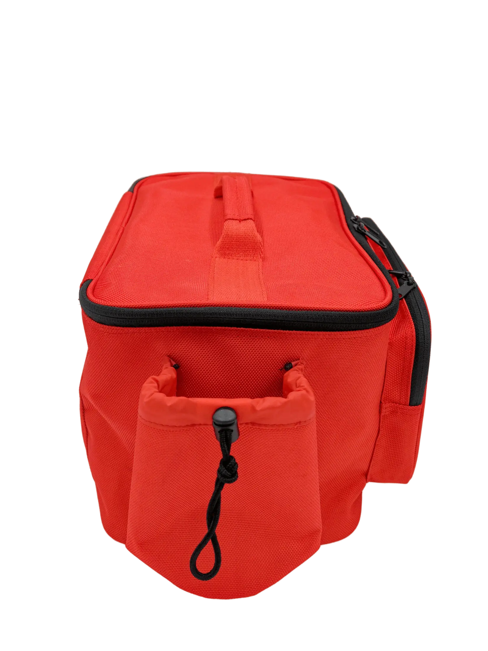 Side view of the red first aid bag showing the drawcord pocket, top carry handle, and structured profile
