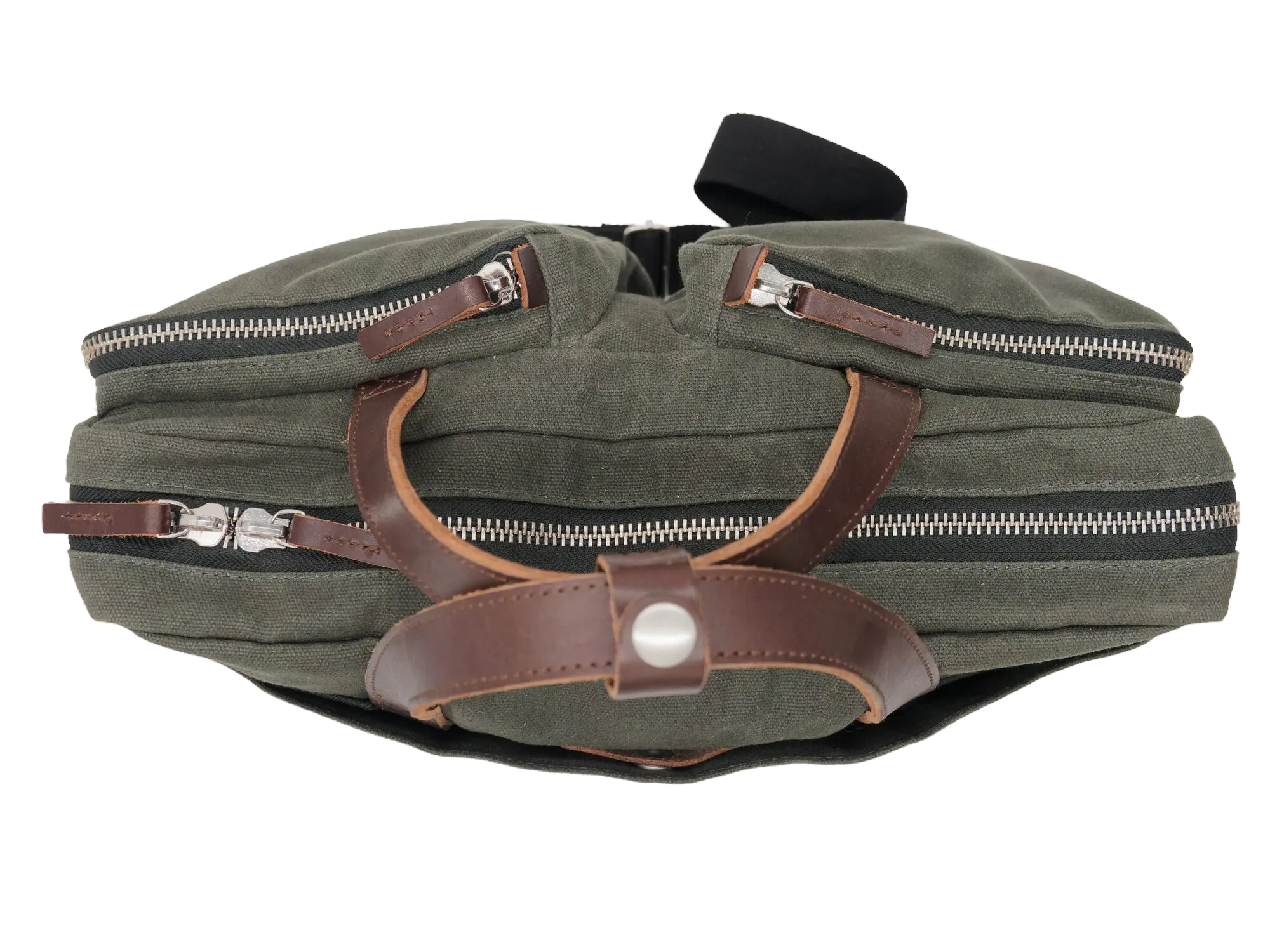 Top-down view of the messenger bag showing both zip compartments, brown leather handle join with rivet hardware, and silver zippers