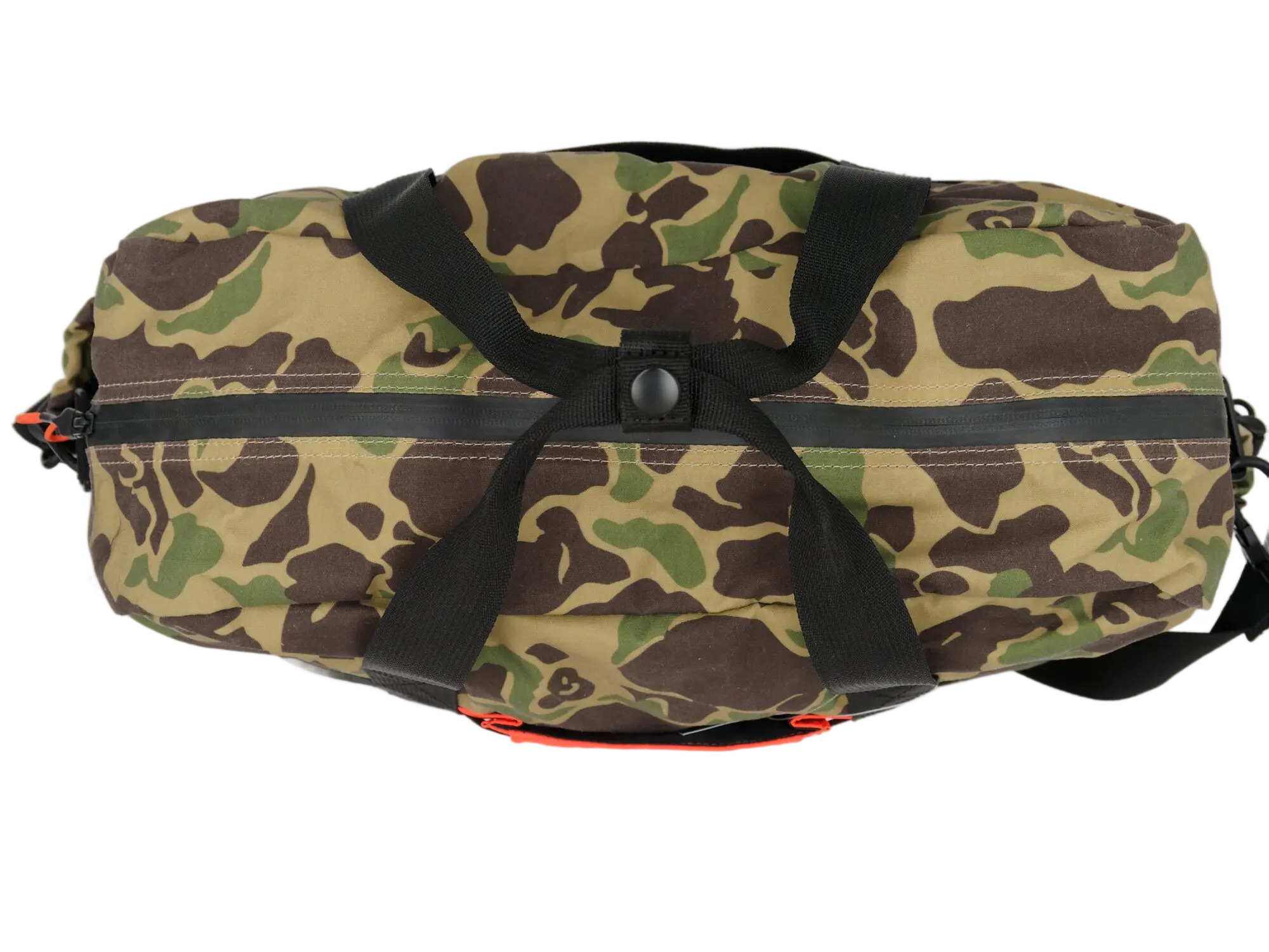 Bottom view of the camo duffle bag showing snap hardware, main zipper track, and orange accent pocket visible at the base