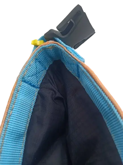 Close-up of the chalk bag opening and belt buckle