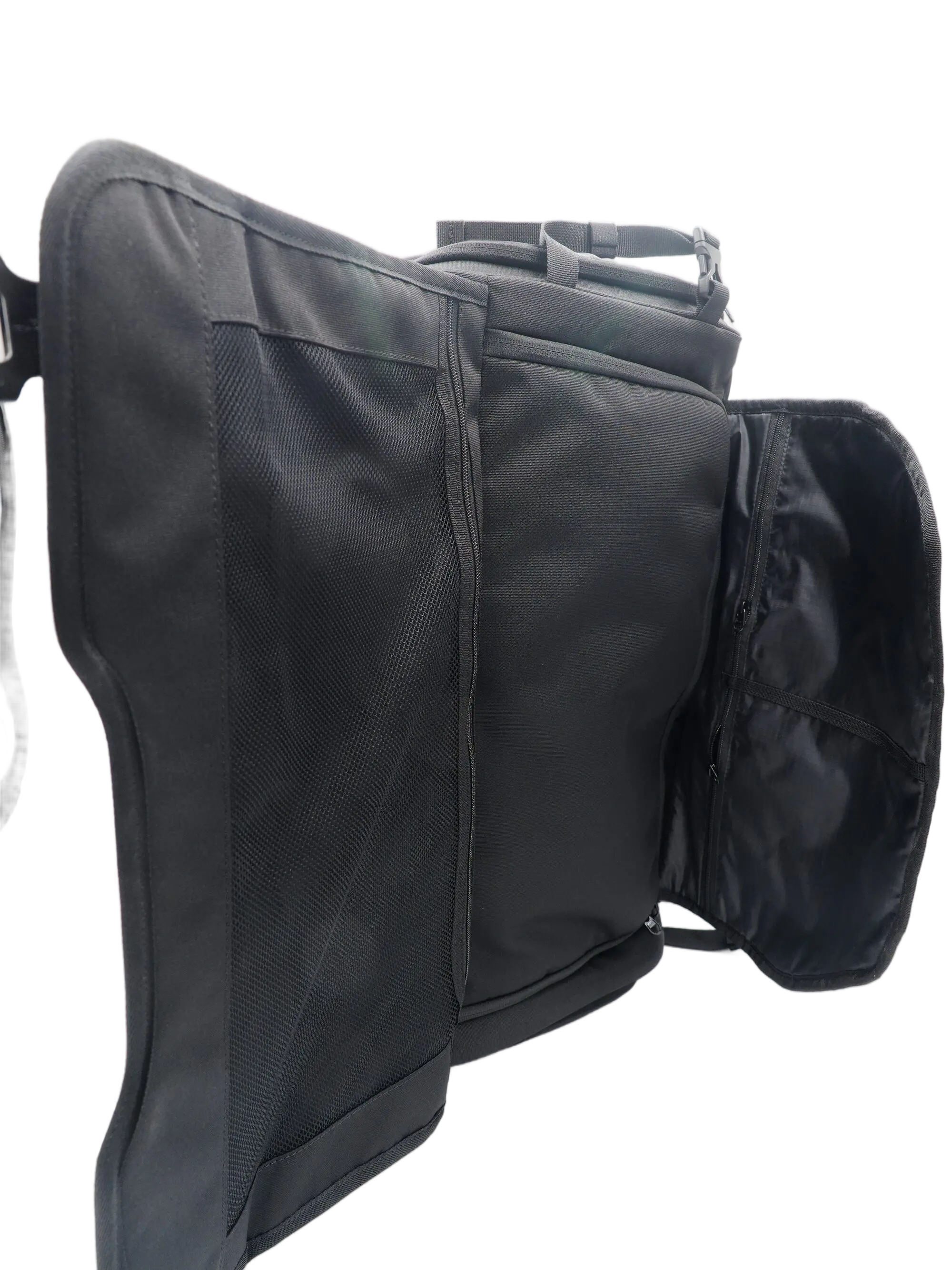 Open interior view of the ADV backpack with flaps extended showing mesh organizer panel and multiple padded compartments