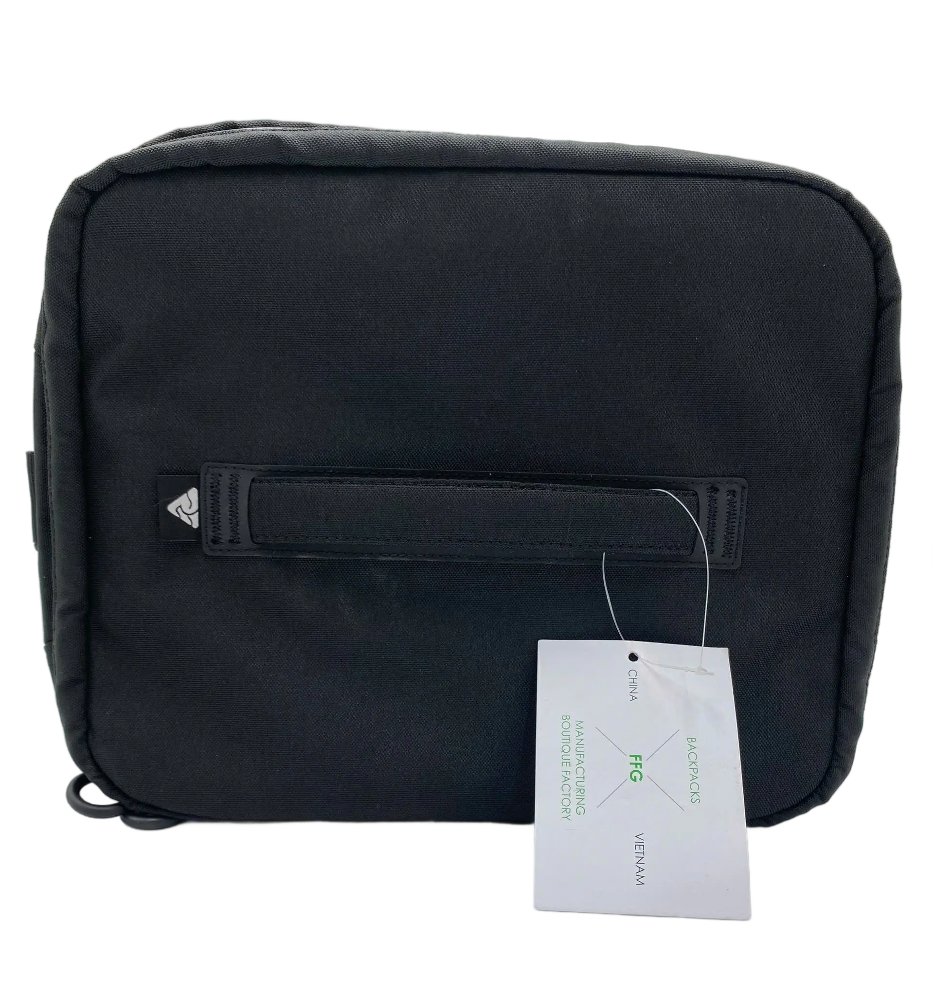 Rear view of the 20L black fishing duffle showing padded top grip handle and FFG Bags hang tag attached to zipper