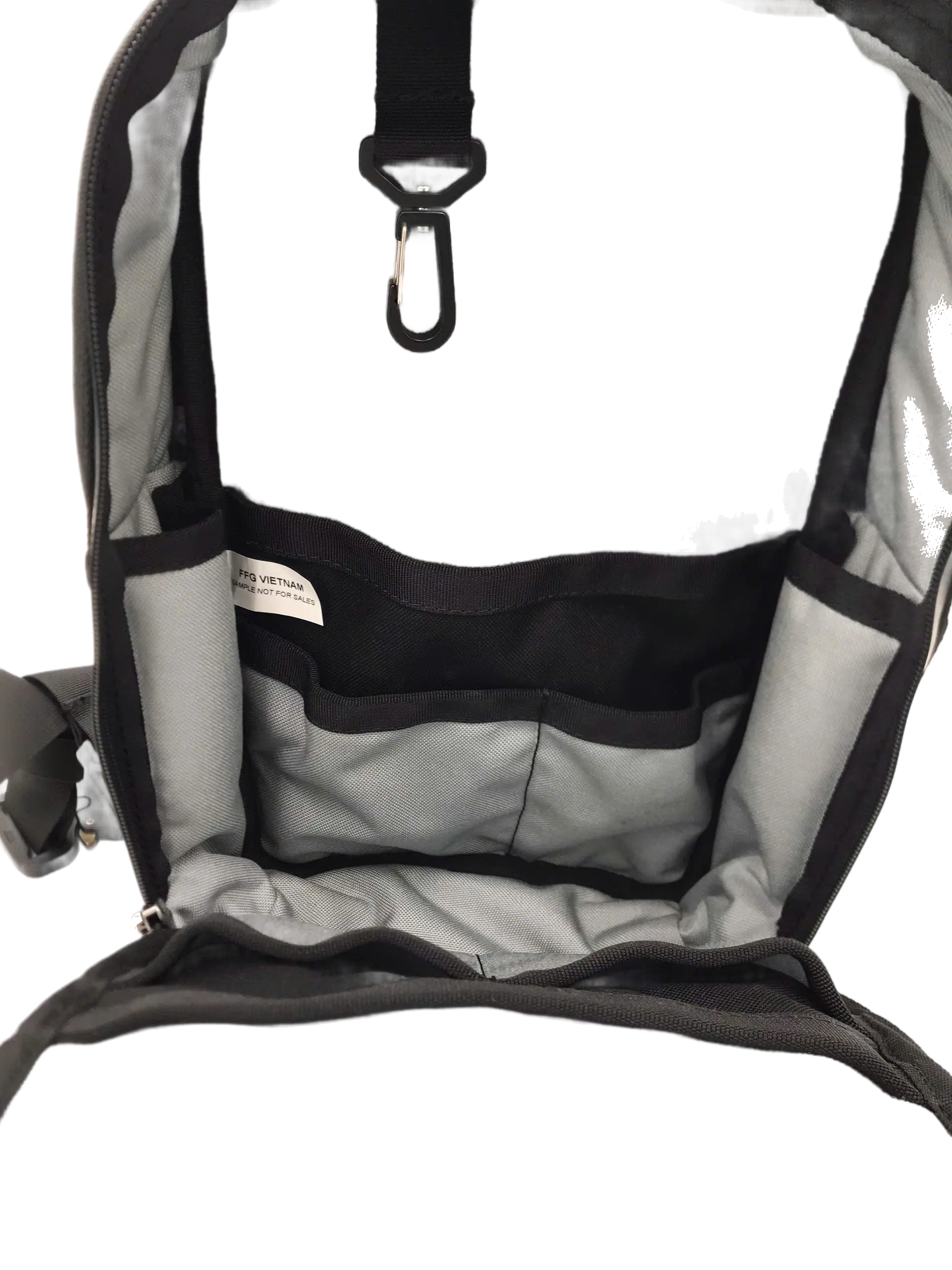 Deep interior view of the open main compartment with grey padded lining, tool loops at the top, and a padded sleeve panel