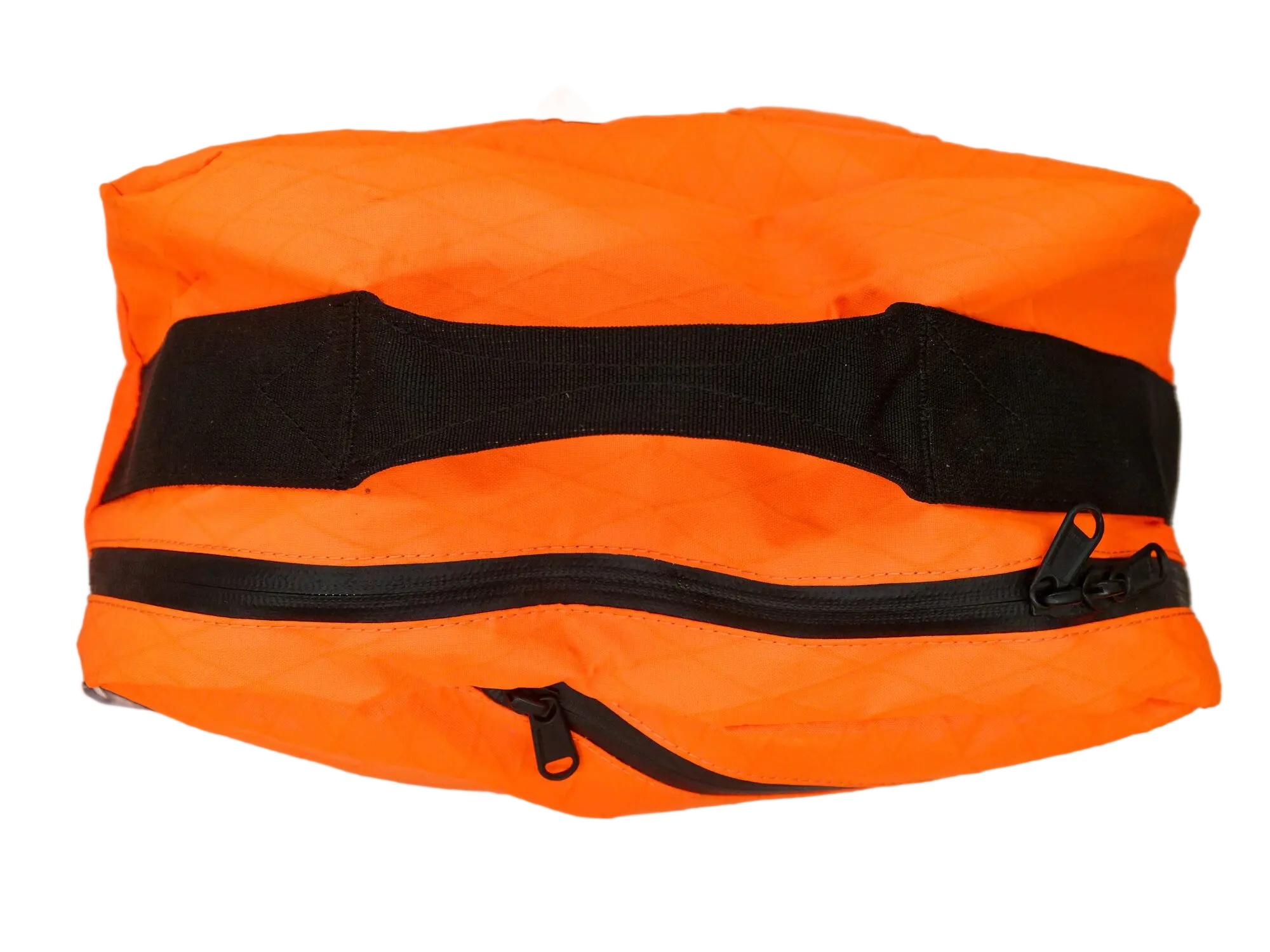 Bottom view of the orange weekender backpack showing two black zippers and padded grab handle on top
