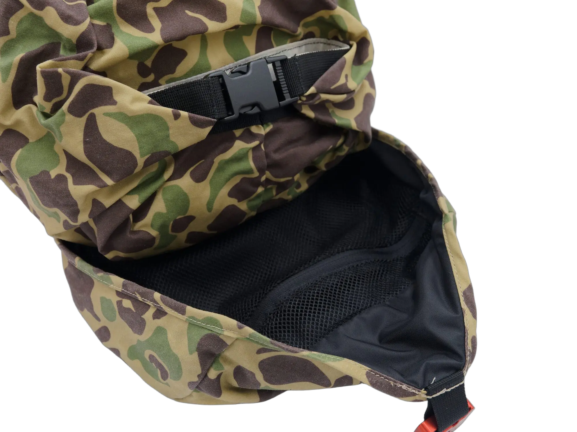 Open top view of the camo backpack showing roll-top with black buckle and black mesh interior lining