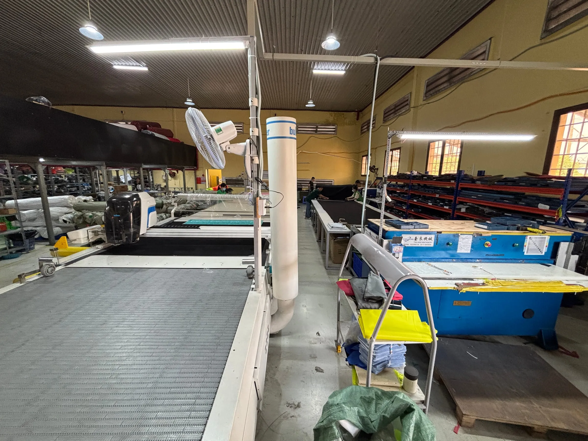 FFG Bags cutting area with automatic cutting tables and organized fabric storage