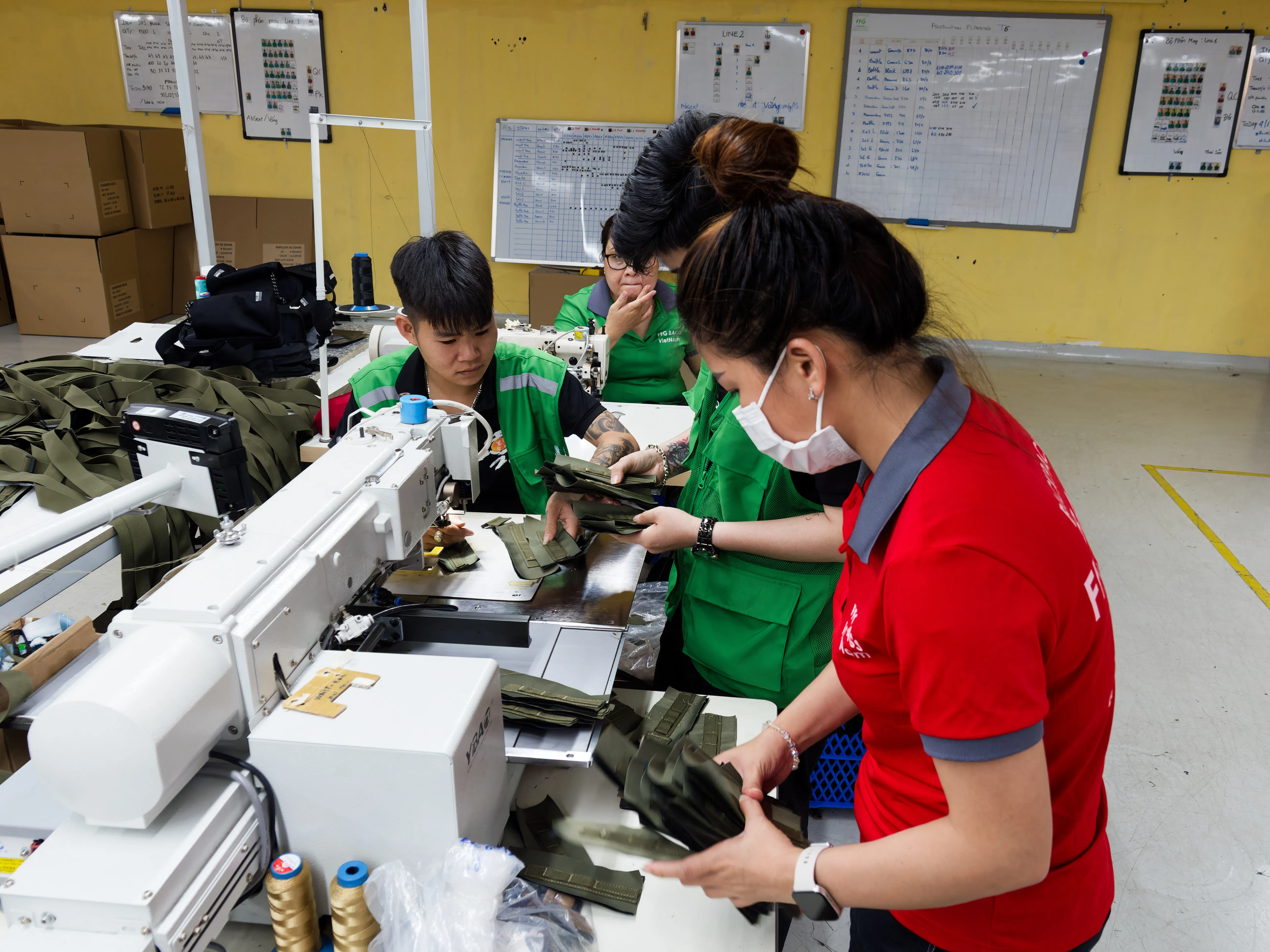 FFG Bags quality control team checking sewn components at the production line