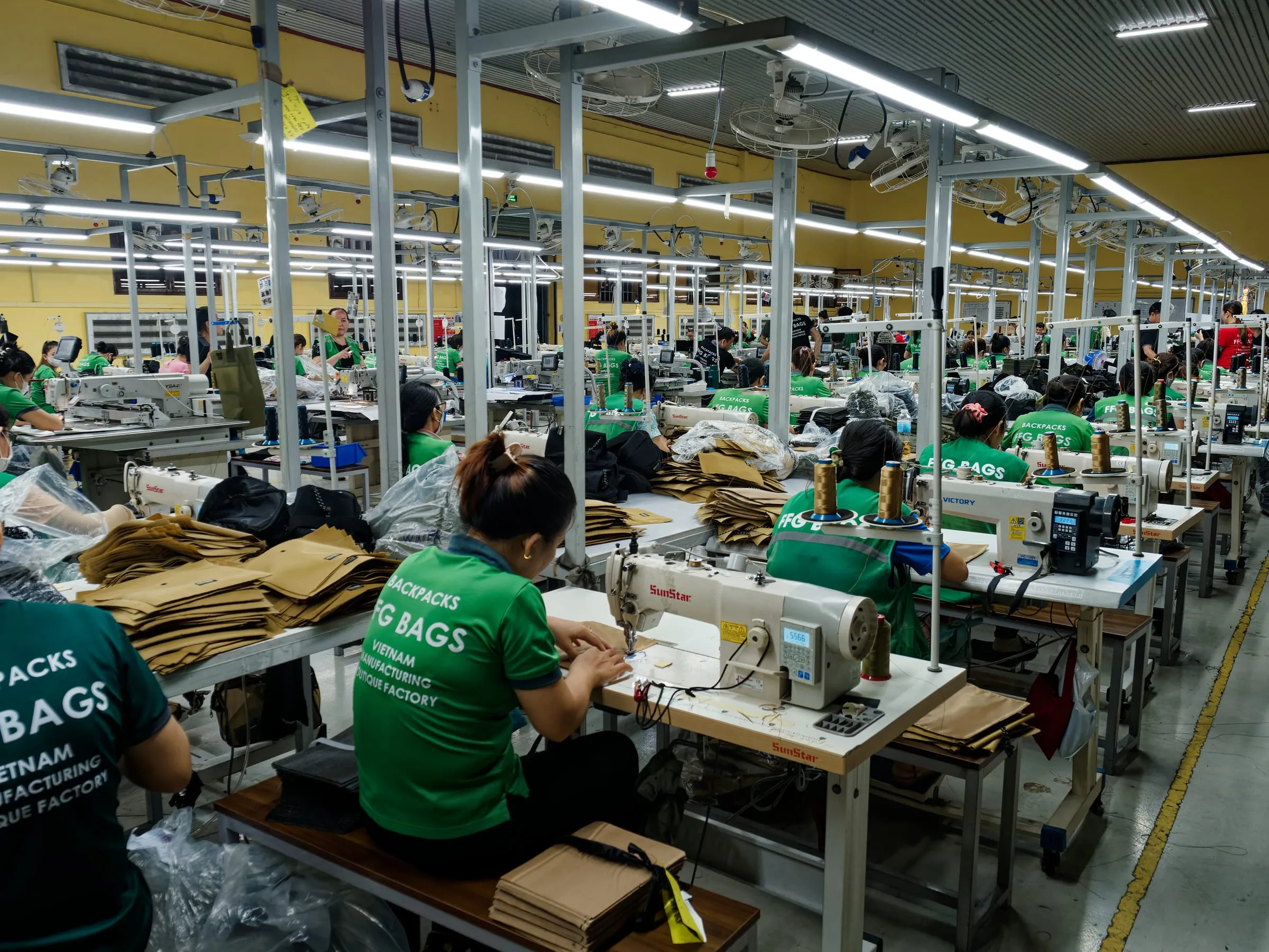 Wide view of FFG Bags sewing floor with operators working on technical bag production