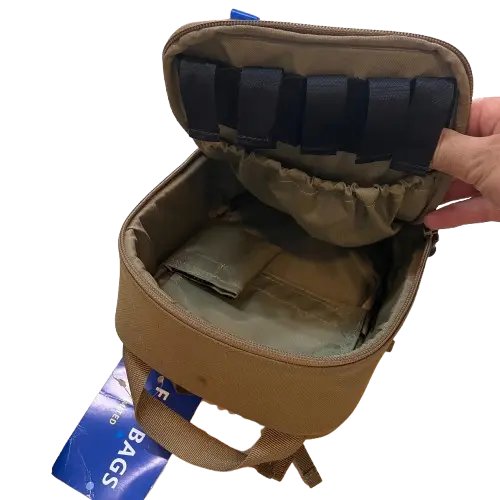 Coyote brown 1000D Cordura utility pouch open, showing padded segmented interior with loop panels and carry handle